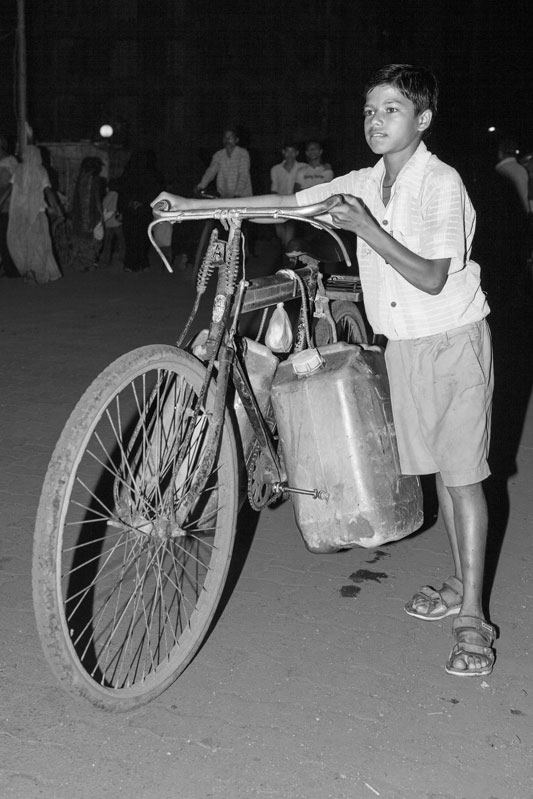 Human Right to Water in Mumbai - Bringing water from a distant group connection in the night